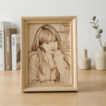 Natural wood frame scene on desk with books and vase