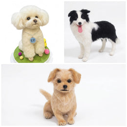 Three small dog figurines or plush toys shown on a white background: a cream poodle-like dog wearing a collar with a blue tag, a black-and-white dog standing with its tongue out, and a tan puppy sitting facing forward.