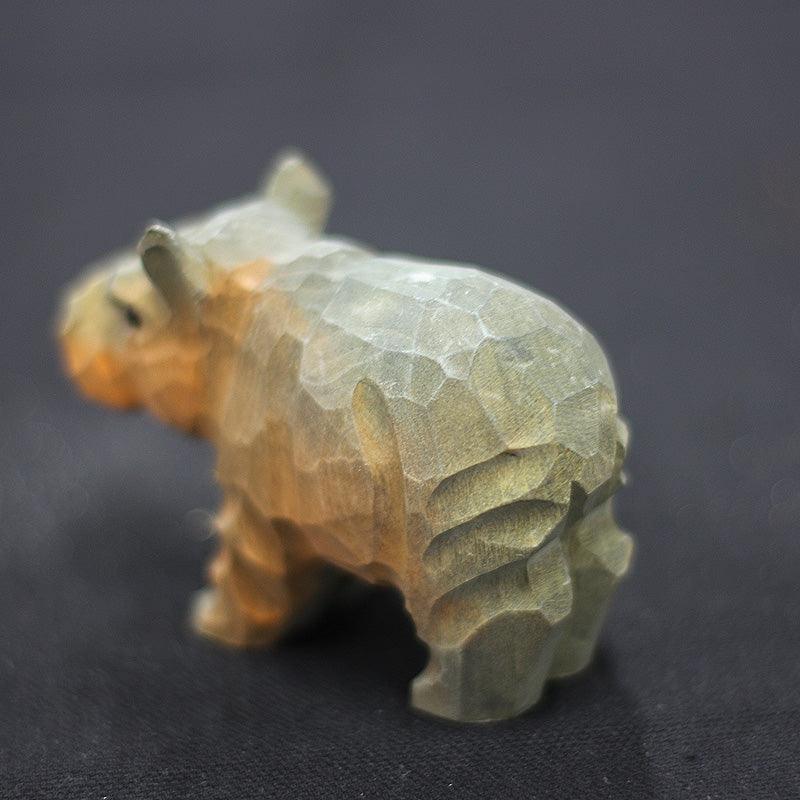 Figuritas de hipopótamo talladas a mano de madera pintada