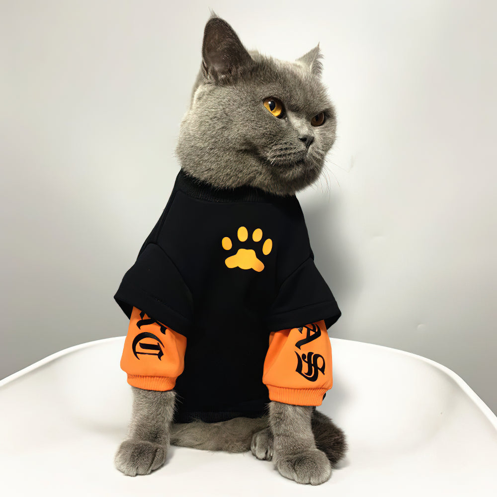 Ropa de gato estilo callejero negro naranja